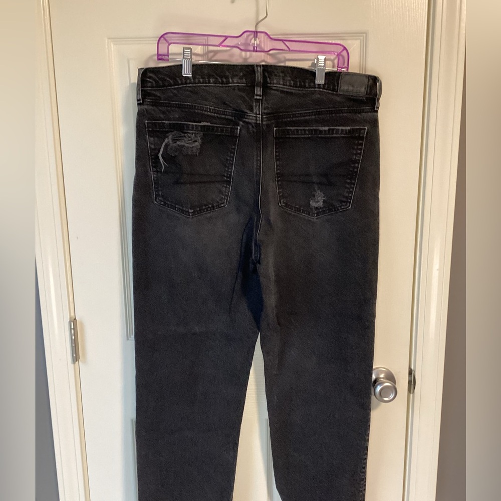 Black stretch American Eagle jeans with a ripped knee-size 14 regular - Picture 3 of 7